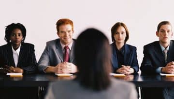 4 businesspeople interviewing candidate